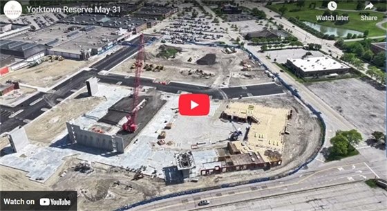 image of youtube video cover image of aerial map over yorktown reserve project with red play button in center