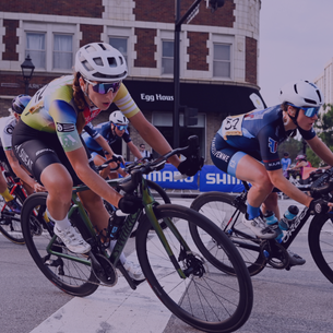 close up photo of cyclists on bikes with helmets and sunglasses