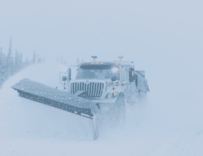 photo of snow plowing snow 